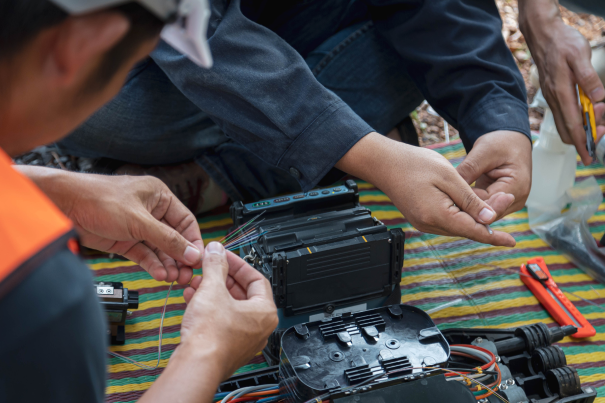 Two people working on hardware together